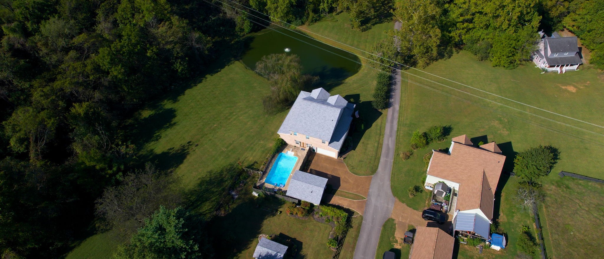 3400 Cobblestone Mills Road Spring Hill, TN 37174 - Photo 57 of 63 an aerial view of house with swimming pool and outdoor space