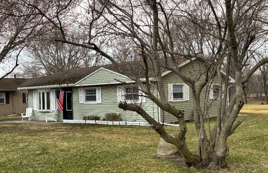 a front view of house with yard