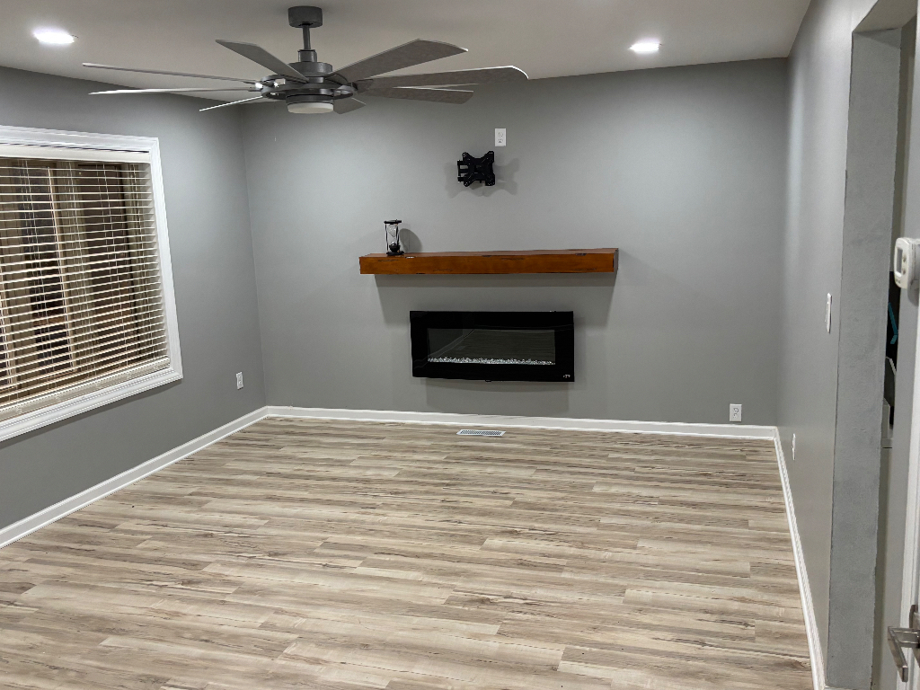 1760 Pine Bluff Road Morris, IL 60450 - Photo 5 of 10 a room with a bed and a ceiling fan