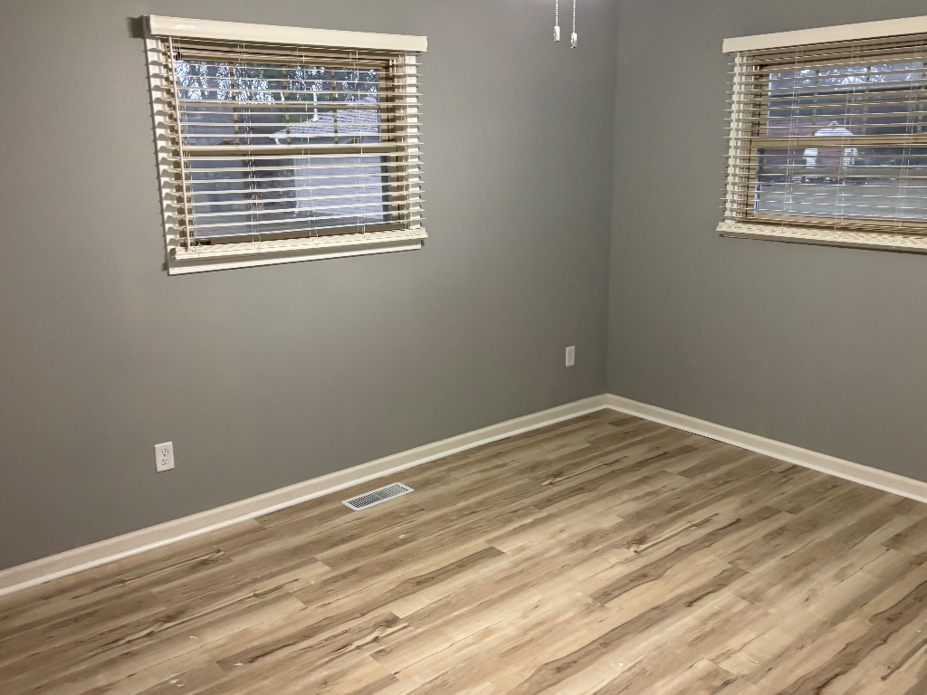 1760 Pine Bluff Road Morris, IL 60450 - Photo 6 of 10 a view of empty room with wooden floor and fan