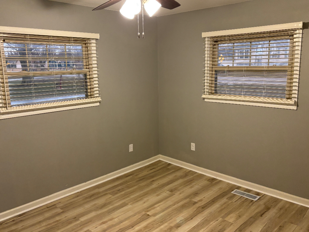 1760 Pine Bluff Road Morris, IL 60450 - Photo 8 of 10 a view of an empty room with wooden floor and a window