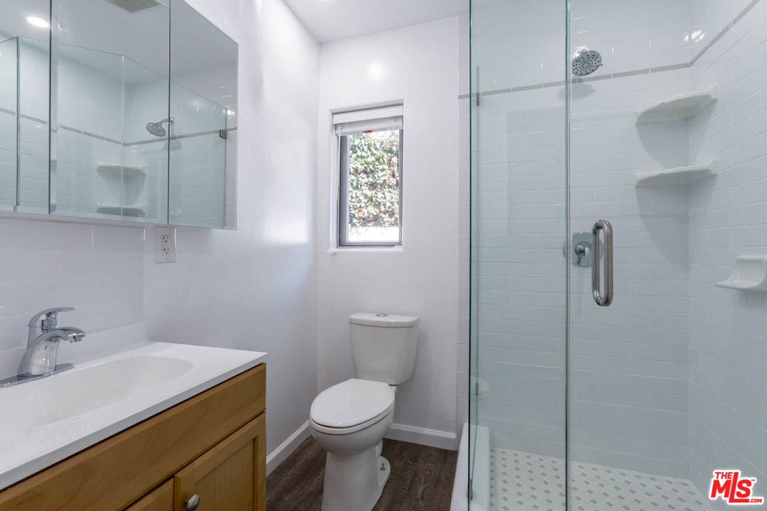 1212 Scenic Drive Glendale, CA 91205 - Photo 11 of 42 a bathroom with a sink toilet and shower