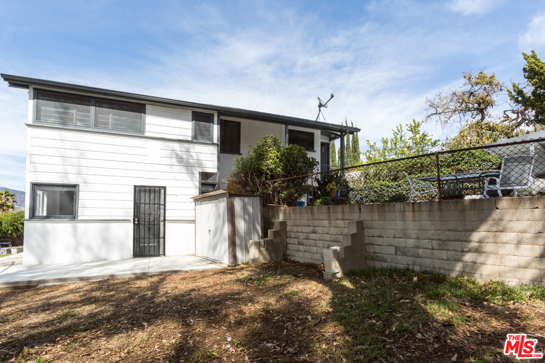 1212 Scenic Drive Glendale, CA 91205 - Photo 18 of 42 a view of house with river in front of it