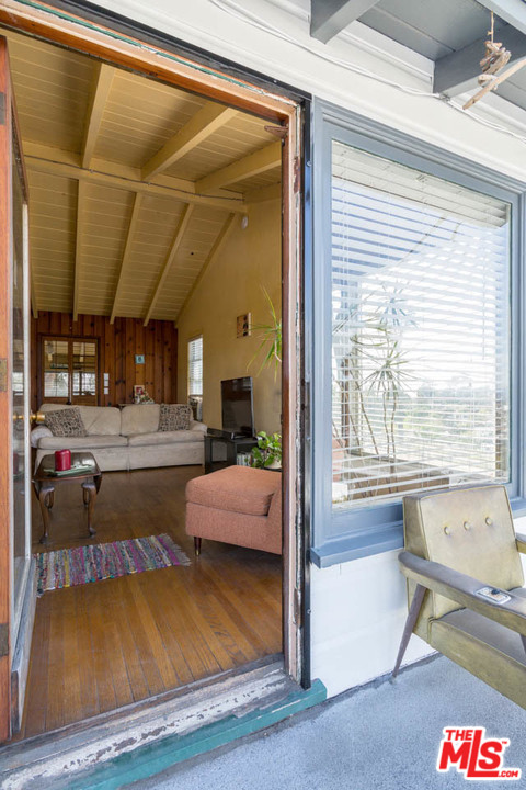 1212 Scenic Drive Glendale, CA 91205 - Photo 20 of 42 a living room with furniture and a table
