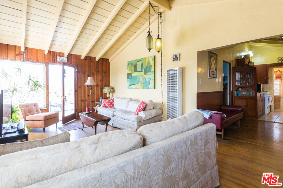 1212 Scenic Drive Glendale, CA 91205 - Photo 23 of 42 a living room with furniture and wooden floor