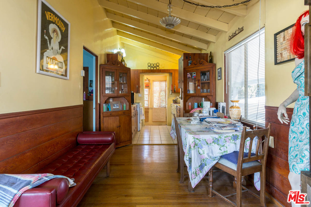 1212 Scenic Drive Glendale, CA 91205 - Photo 24 of 42 a view of a dining room with furniture and a chandelier