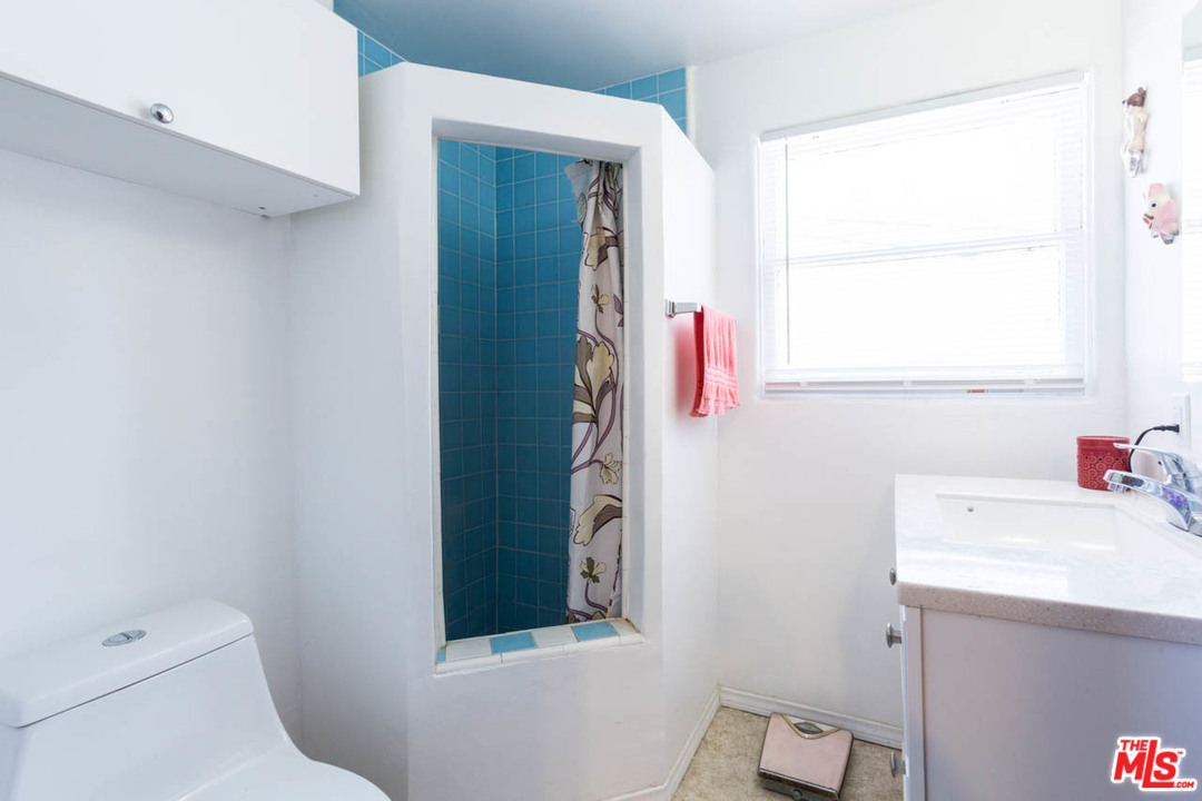 1212 Scenic Drive Glendale, CA 91205 - Photo 28 of 42 a bathroom with a sink and a toilet