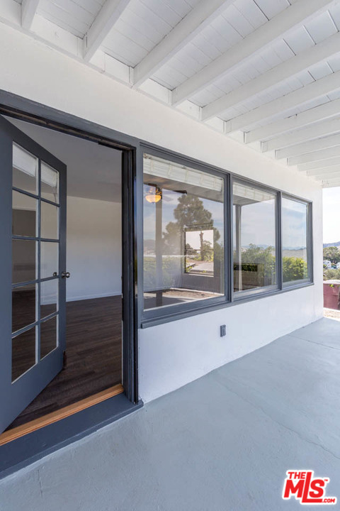 1212 Scenic Drive Glendale, CA 91205 - Photo 4 of 42 a view of an empty room with a window