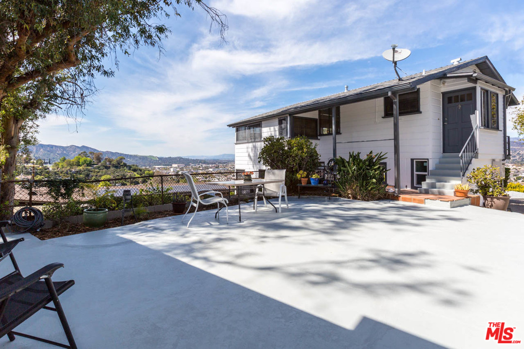 1212 Scenic Drive Glendale, CA 91205 - Photo 31 of 42 a view of a house with sitting area and furniture