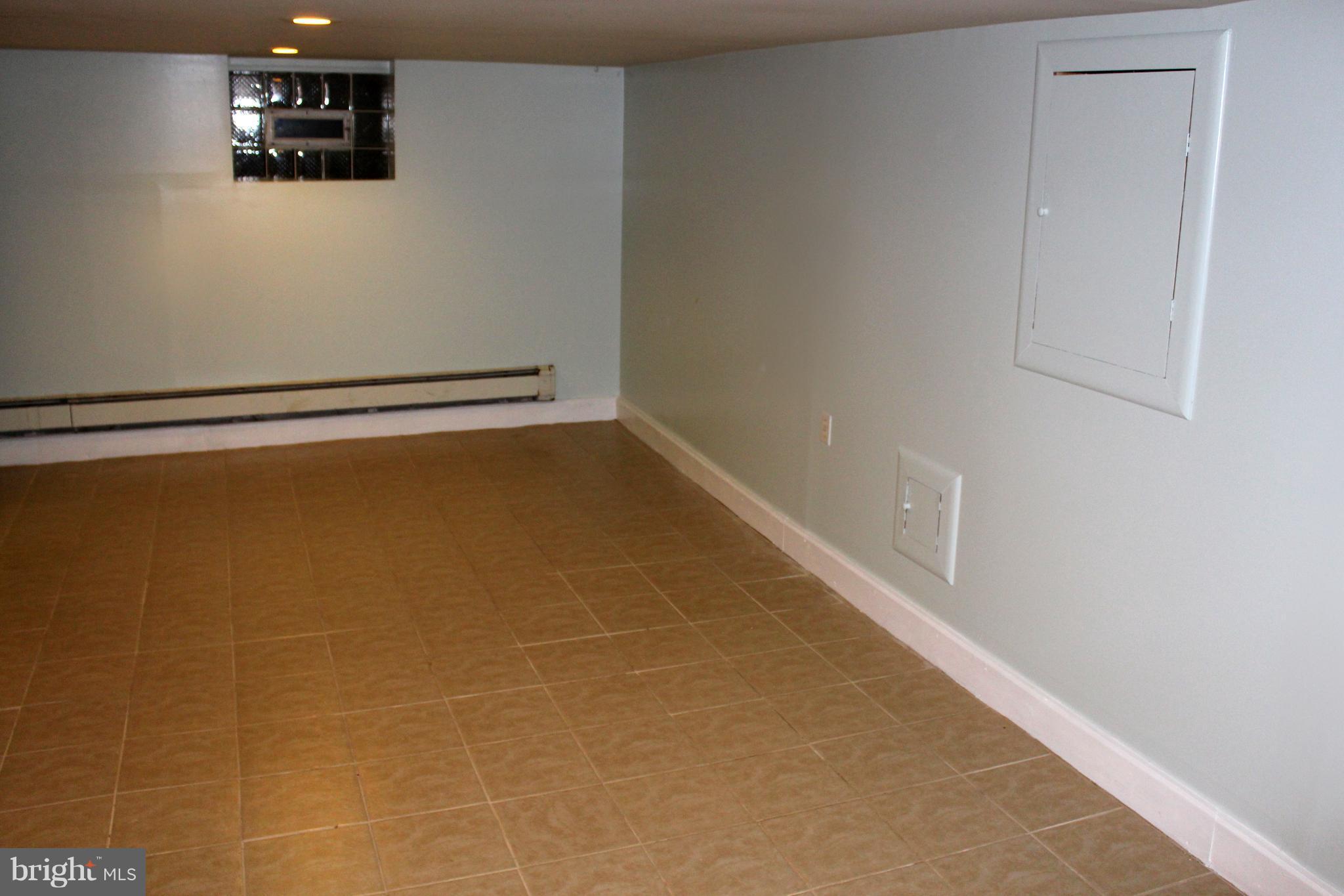3207 Beverly Road Baltimore, MD 21214 - Photo 21 of 23 Large finished basement