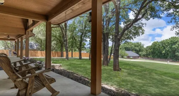a view of backyard with green space
