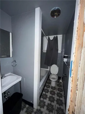 a bathroom with a sink and a toilet