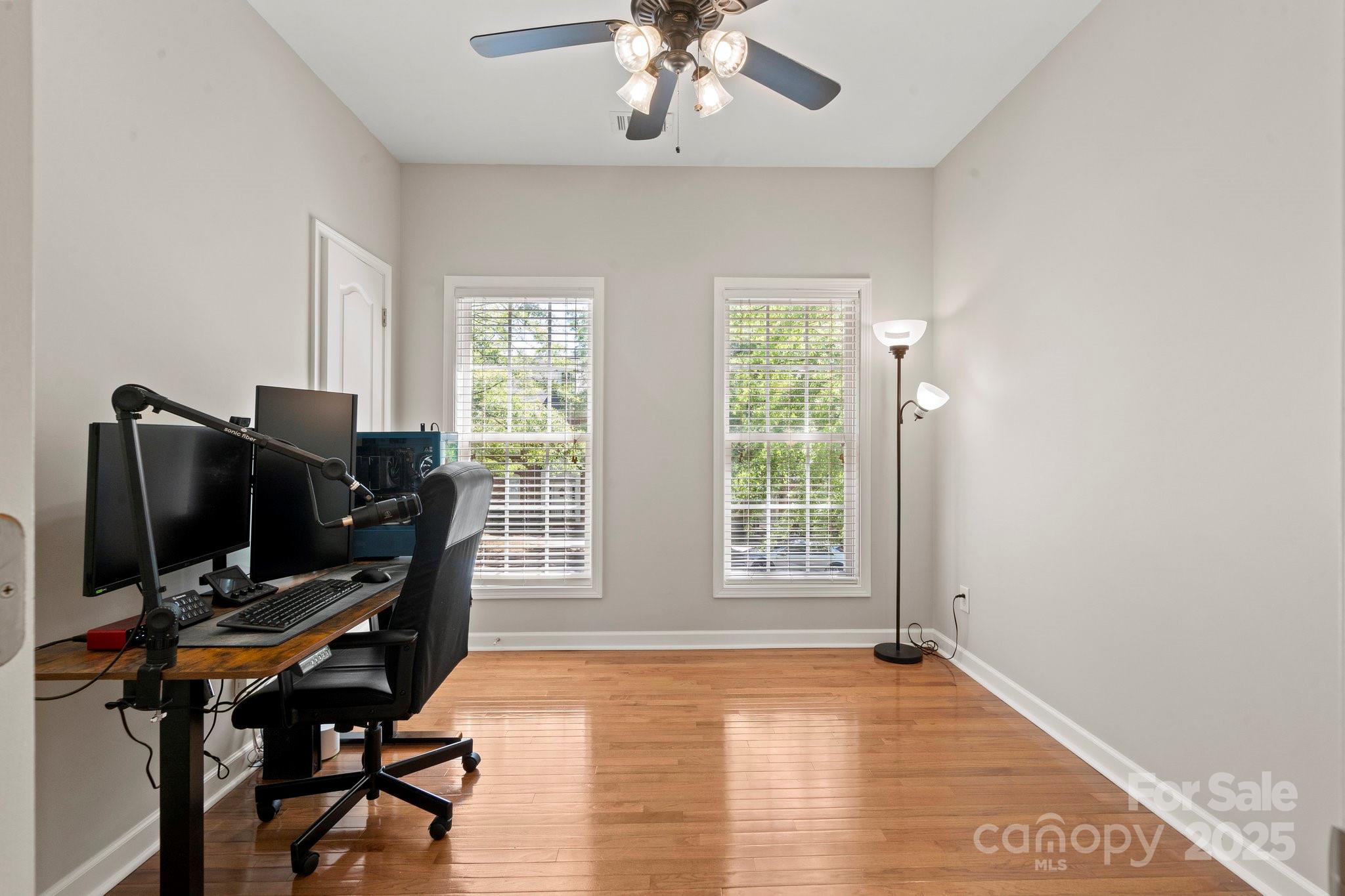 164 Singleton Road Mooresville, NC 28117 - Photo 25 of 36 a view of a workspace with furniture and a window