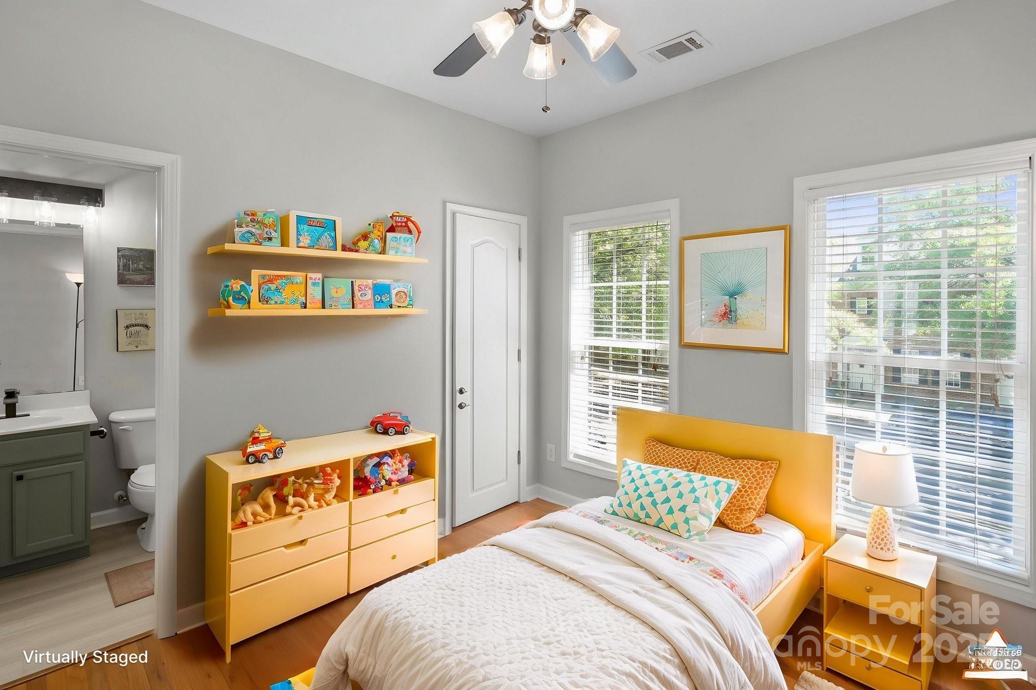 164 Singleton Road Mooresville, NC 28117 - Photo 27 of 36 a bedroom with a bed and a window