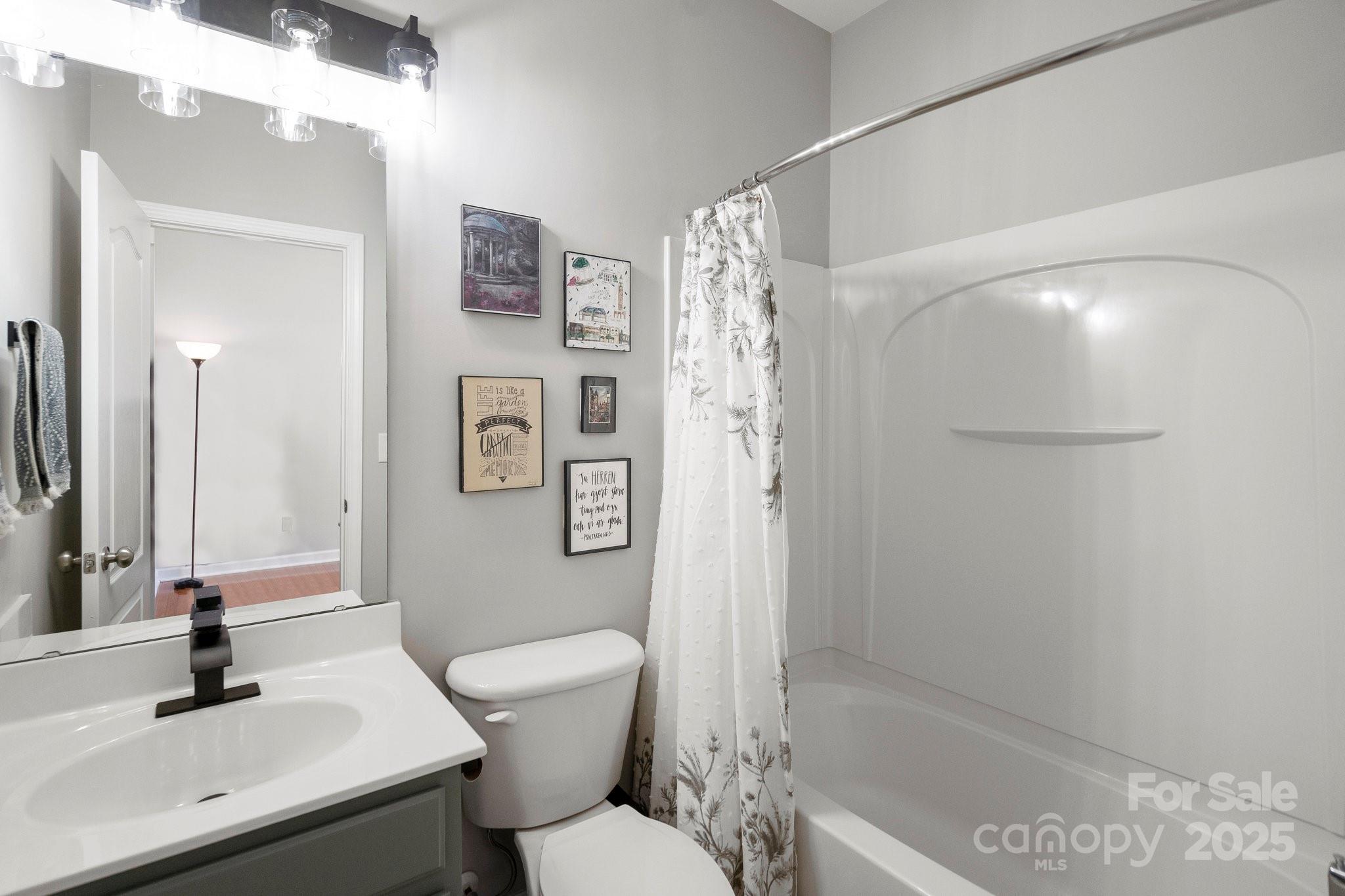 164 Singleton Road Mooresville, NC 28117 - Photo 29 of 36 a bathroom with a sink toilet and shower