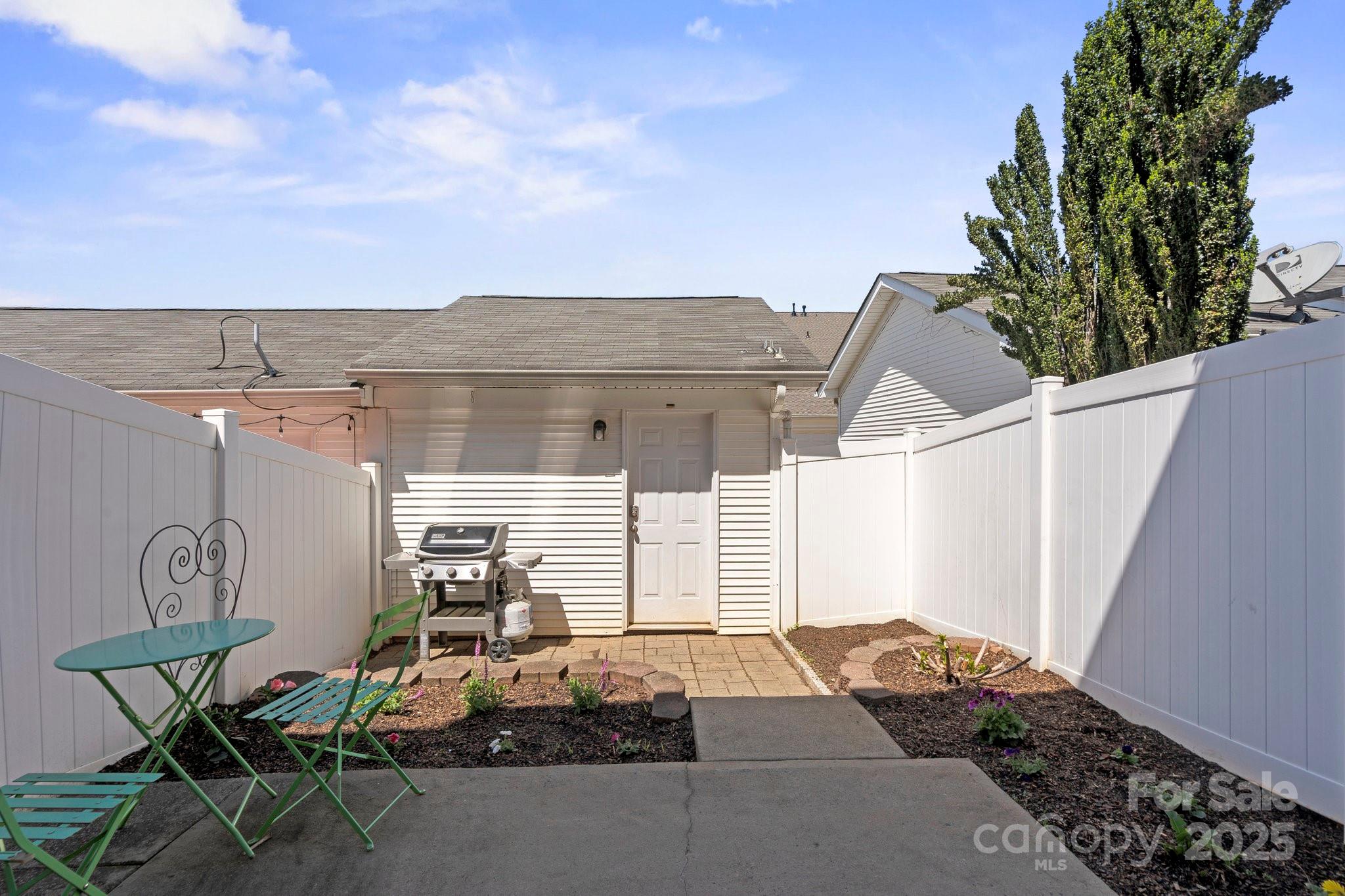 164 Singleton Road Mooresville, NC 28117 - Photo 31 of 36 a view of backyard of house with seating space