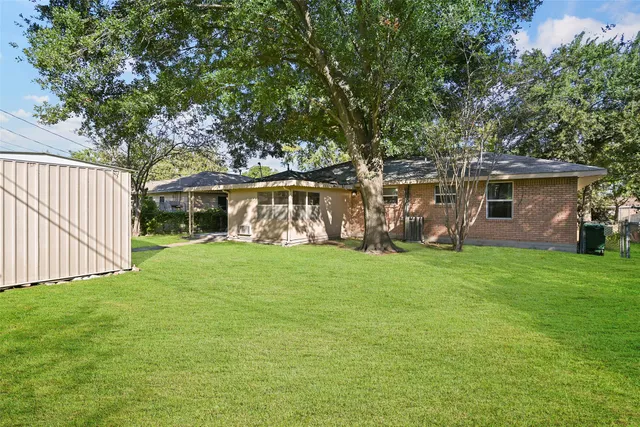 a view of backyard with green space