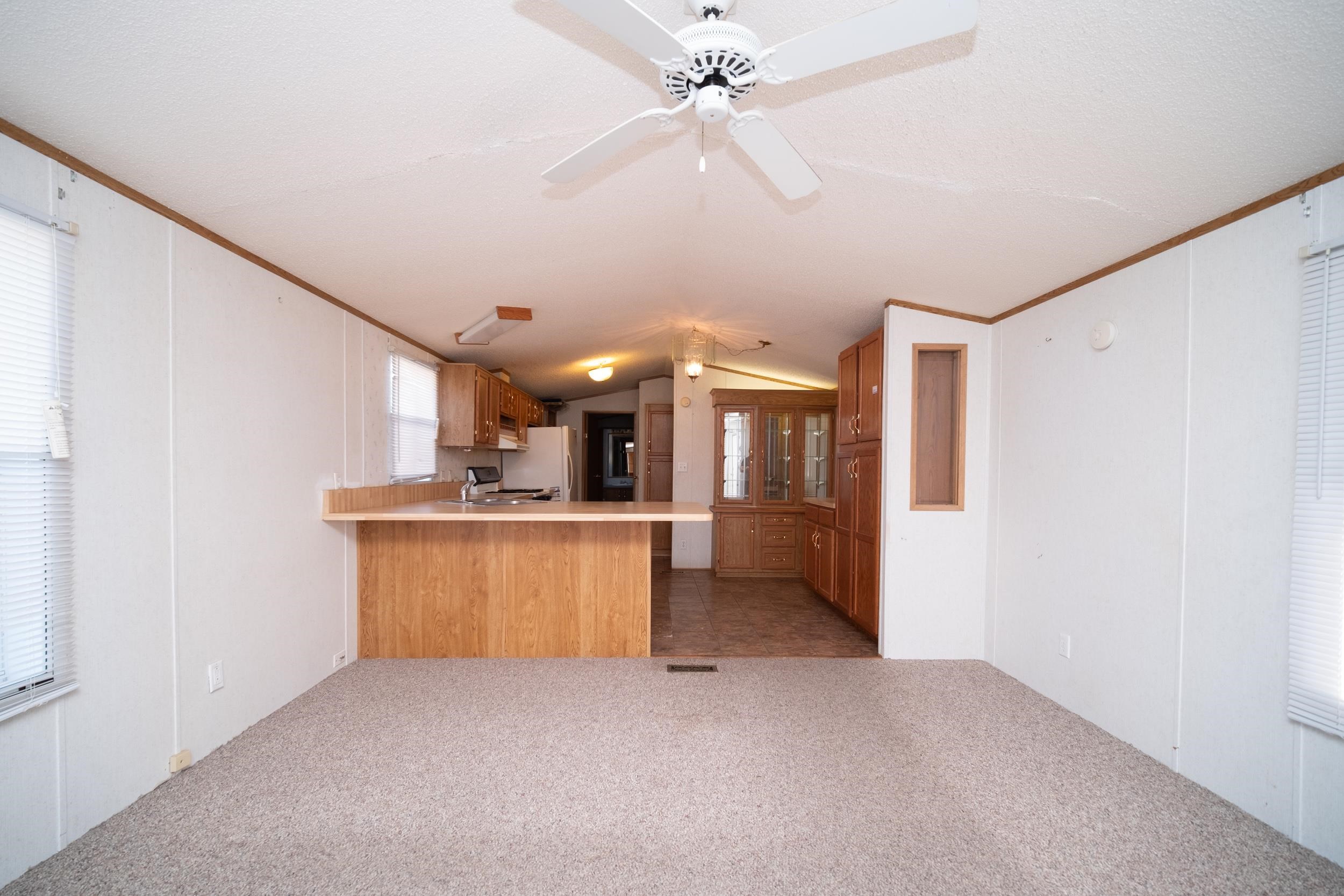 1202 Spring Circle Belvidere, IL 61008 - Photo 9 of 16 a view of a kitchen with a sink and a refrigerator