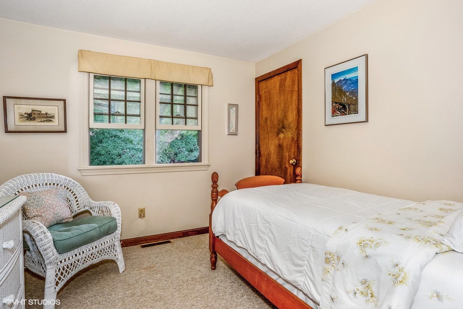 14 Nathan Road Centerville, MA 02632 - Photo 12 of 16 a bedroom with a bed and a couch