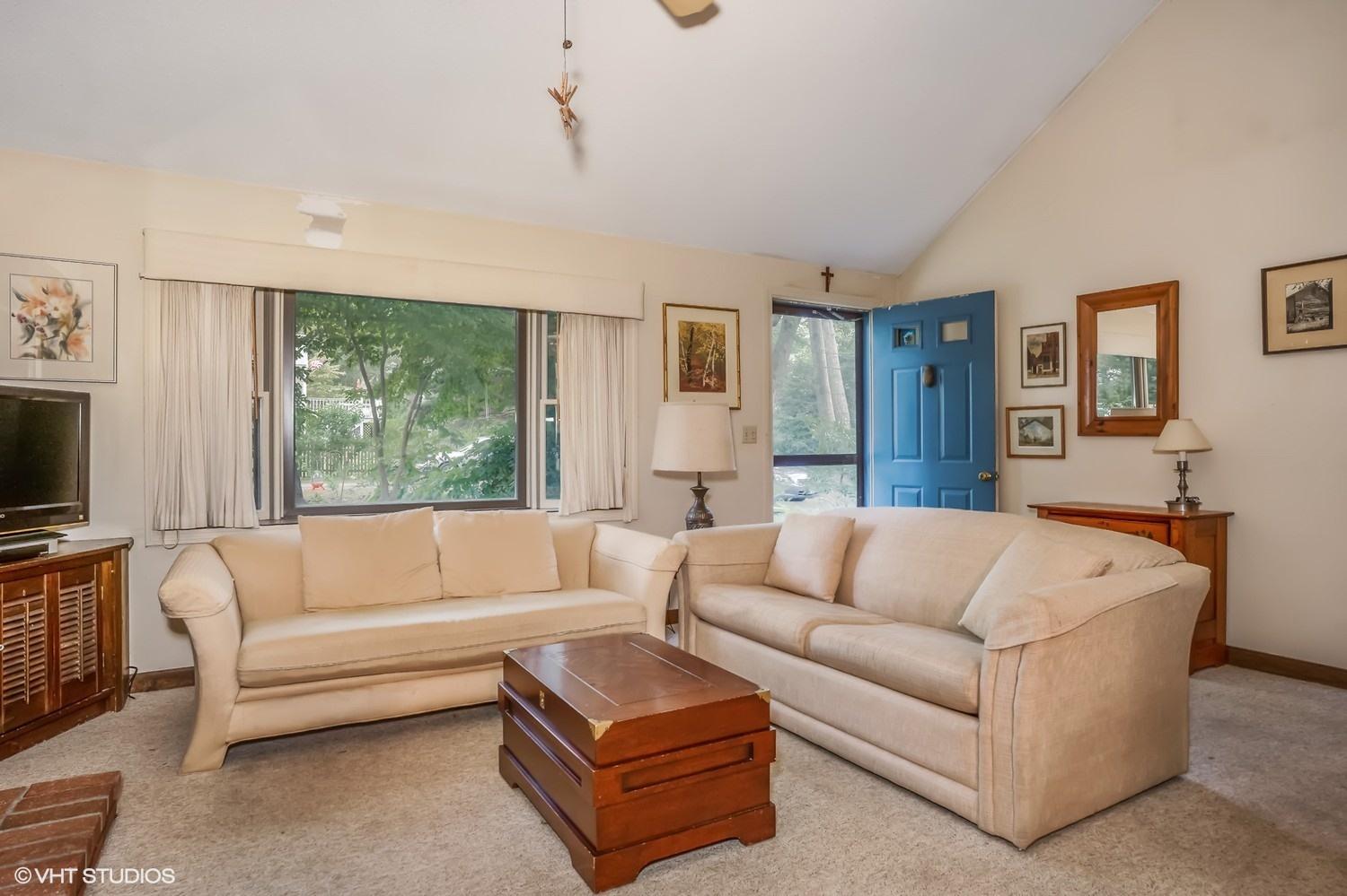 14 Nathan Road Centerville, MA 02632 - Photo 3 of 16 a living room with furniture and a flat screen tv