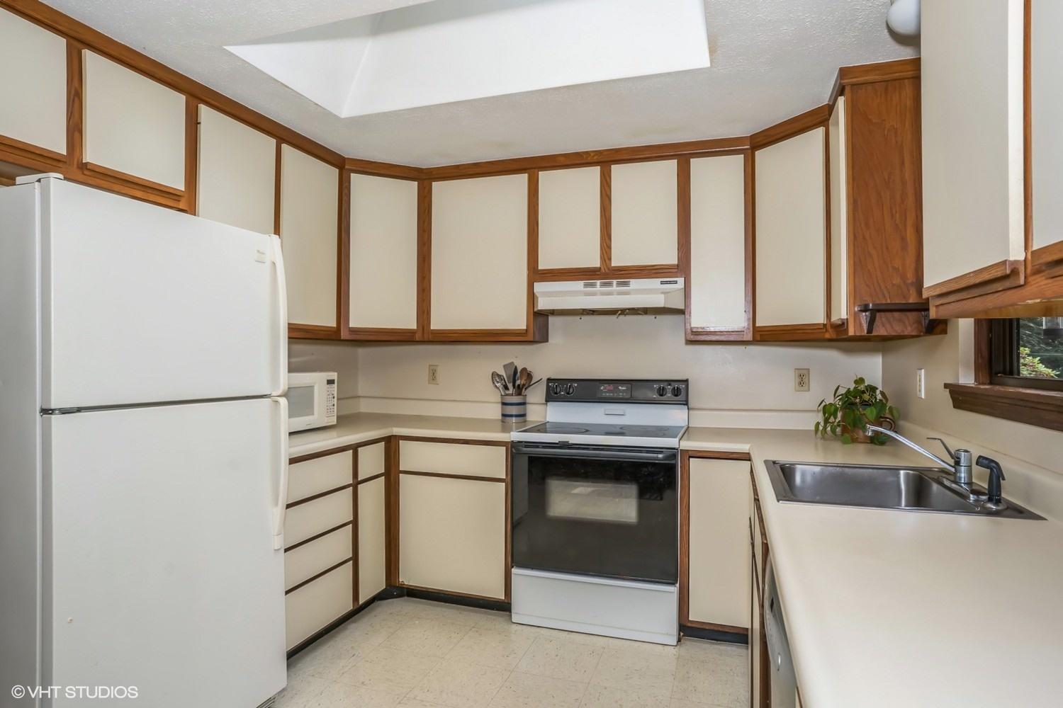 14 Nathan Road Centerville, MA 02632 - Photo 5 of 16 a kitchen with appliances cabinets and a sink