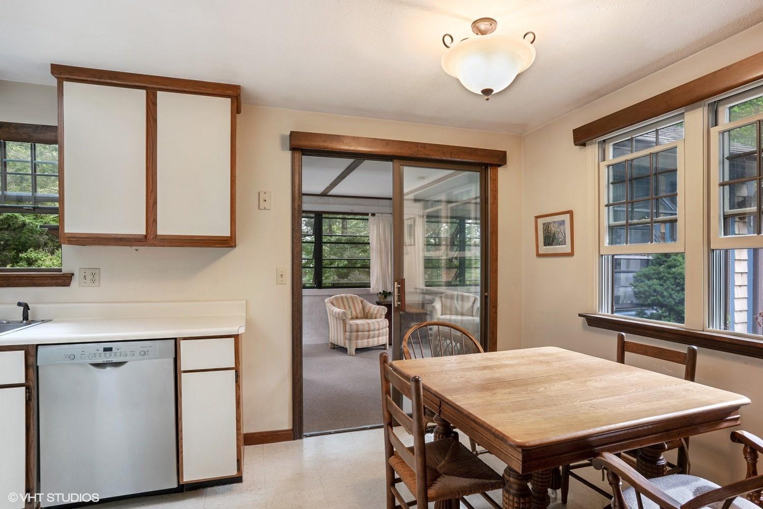 14 Nathan Road Centerville, MA 02632 - Photo 6 of 16 a view of a dining room with furniture window and outside view