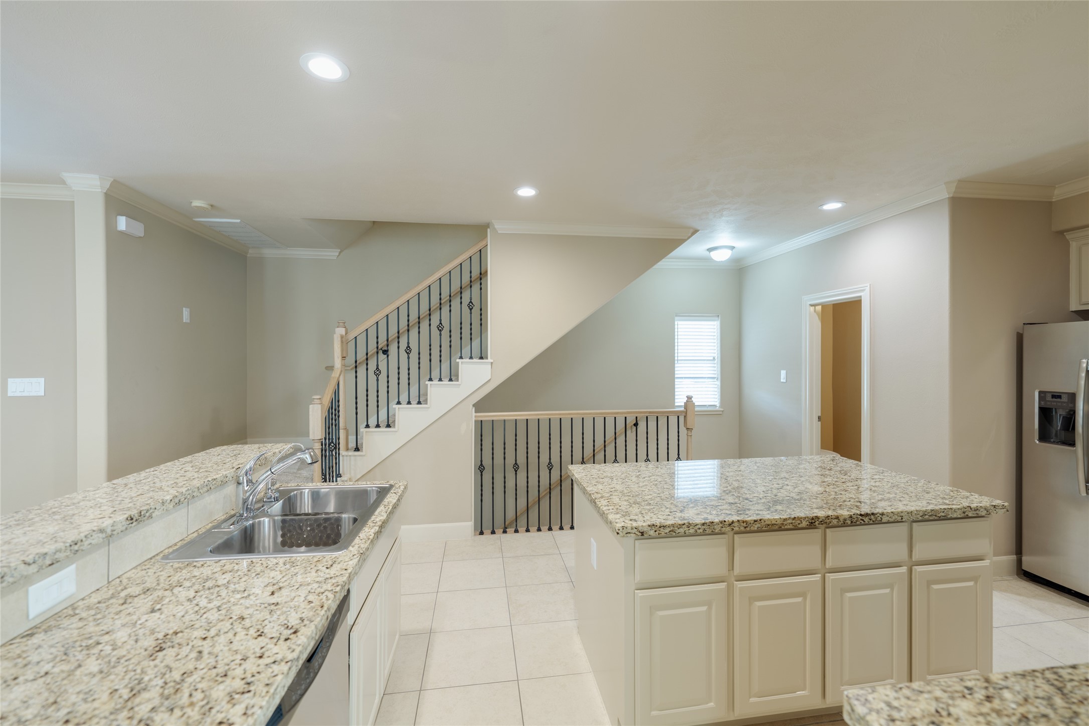 5612 Lacy Street Houston, TX 77007 - Photo 13 of 22 a bathroom with a granite countertop sink and a large mirror