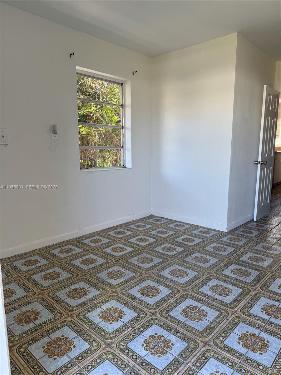 3690 Southwest 14th Street, Unit 1 Miami, FL 33145 - Photo 3 of 13 a view of a bedroom