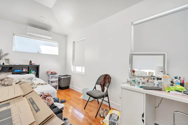 a bathroom with a shower and a sink