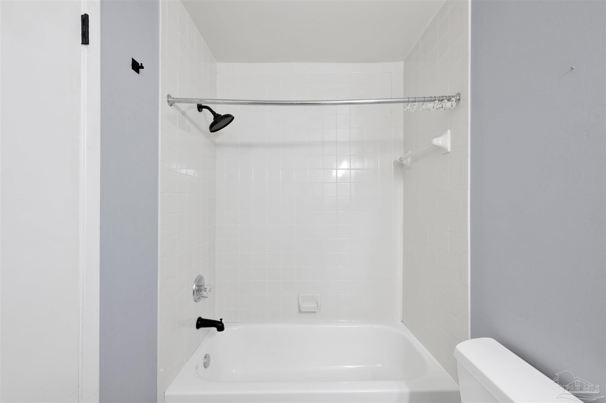 14100 River Road, Unit 334 Perdido Key, FL 32507 - Photo 25 of 35 a bathroom with a bathtub