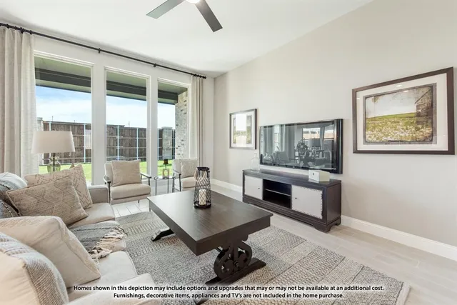 a kitchen with sink a microwave and cabinets