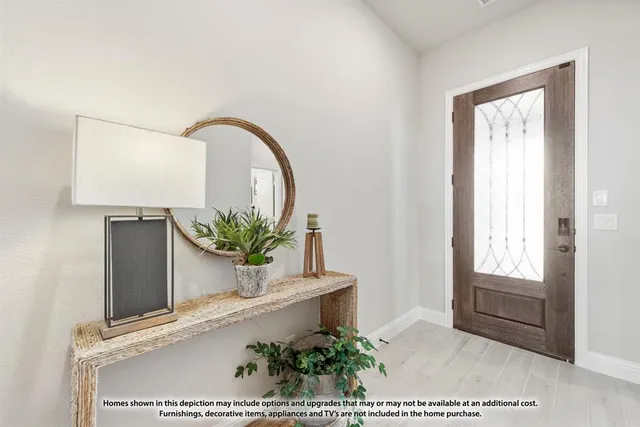 a vase of flowers sitting on a table