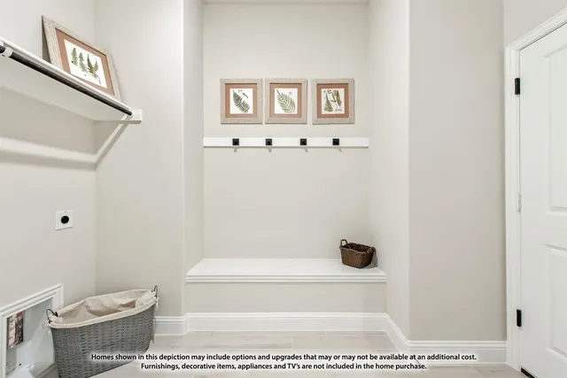 a bedroom with a bed a mirror and a window