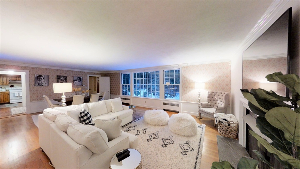 78 Draper Road Wayland, MA 01778 - Photo 1 of 14 a large bedroom with a bed and a couch