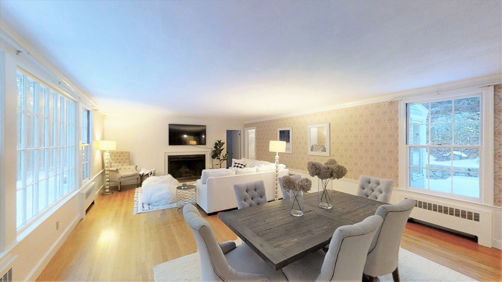 78 Draper Road Wayland, MA 01778 - Photo 3 of 14 a living room with fireplace furniture and a large window