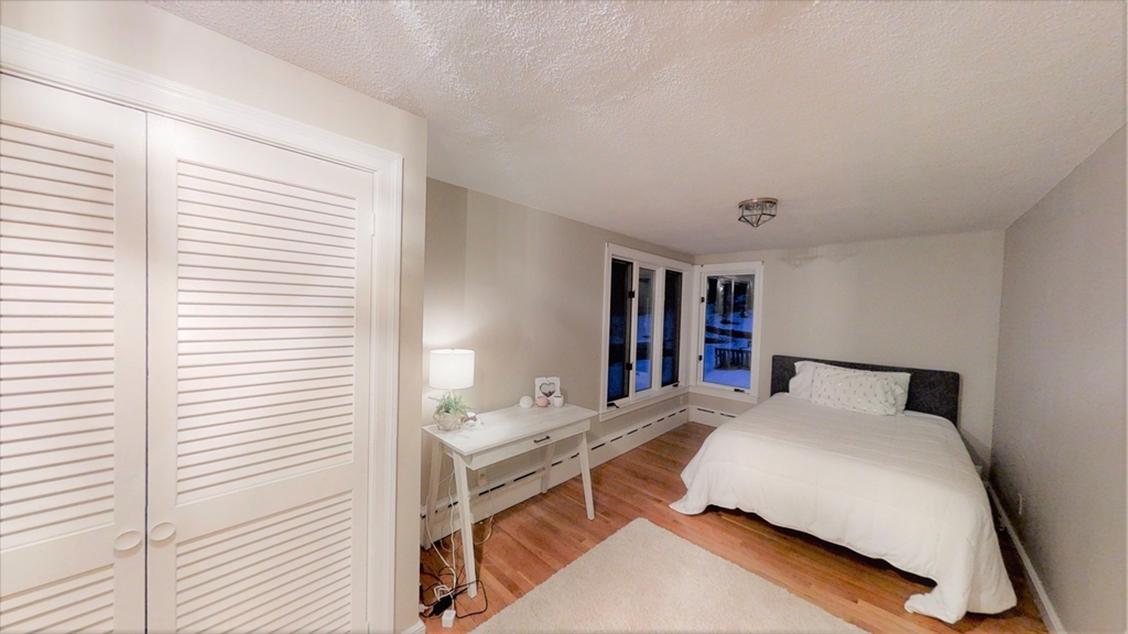 78 Draper Road Wayland, MA 01778 - Photo 9 of 14 a bedroom with a bed and a window