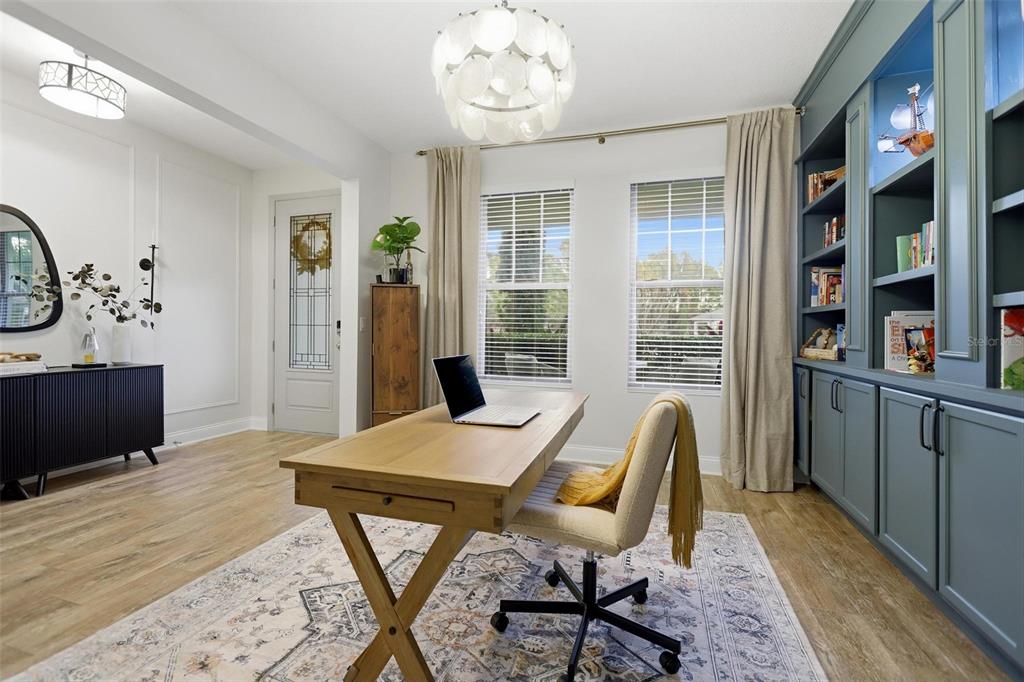 162 Ancona Avenue DeBary, FL 32713 - Photo 8 of 51 a view of a dining room with furniture and wooden floor