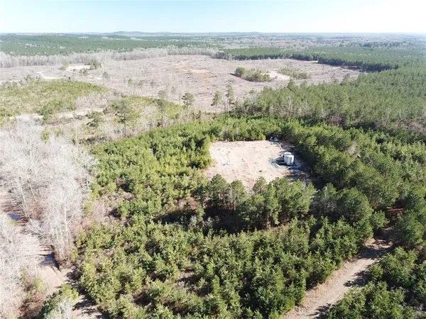 a view of an ocean and a mountain