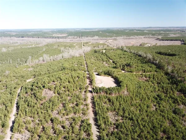 a view of an ocean and a mountain