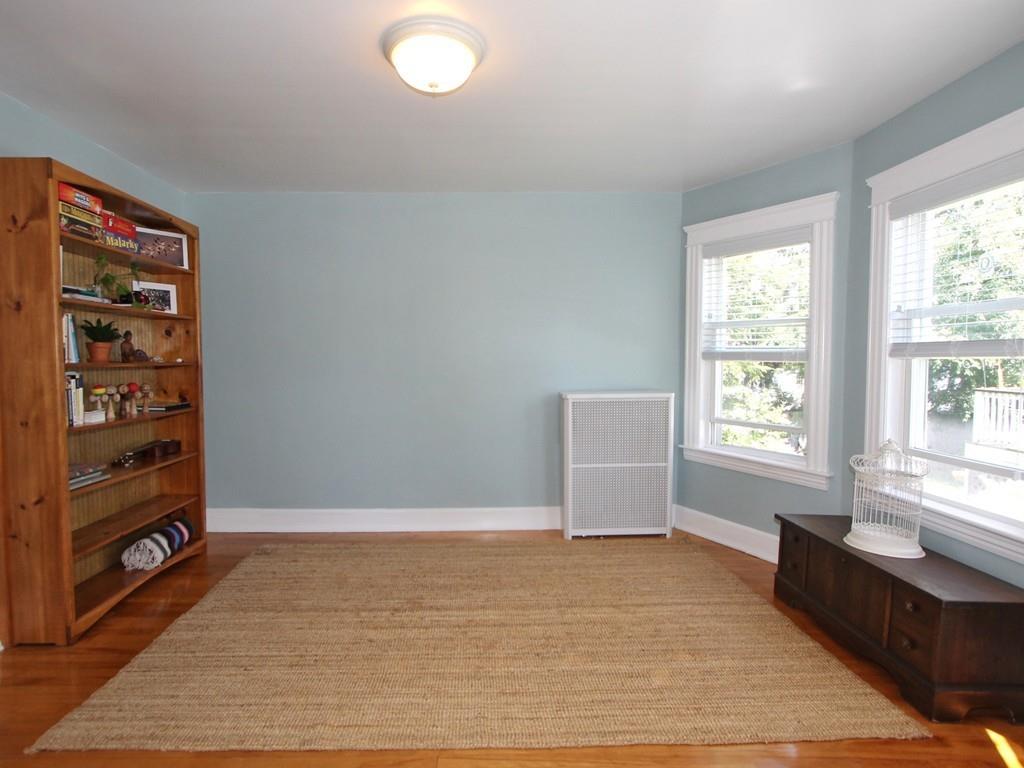 65 King Philip Road Worcester, MA 01606 - Photo 3 of 15 a view of an empty room with cabinet and a window
