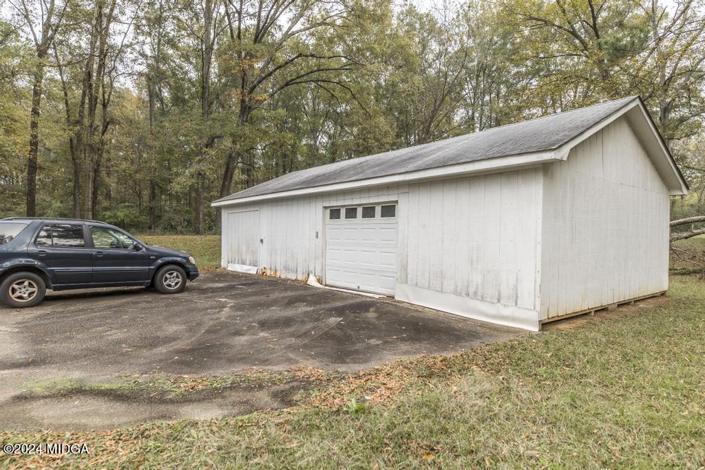 6909 Forsyth Road Macon, GA 31210 - Photo 52 of 53 a view of a car garage
