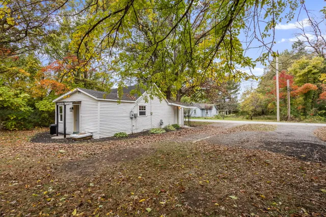 a house with a tree in the background