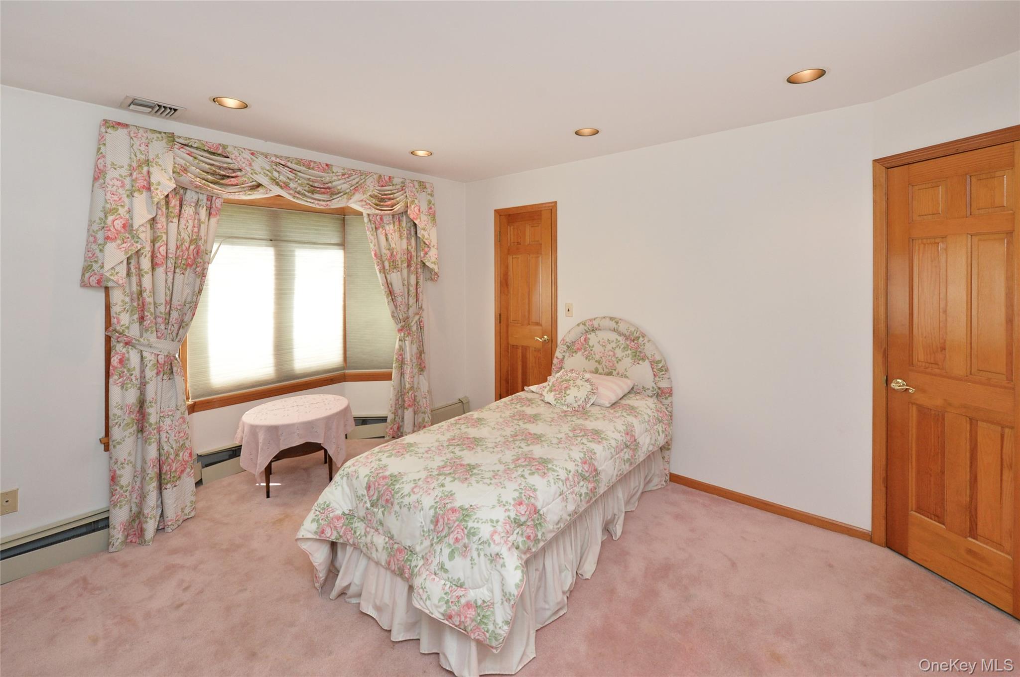 24 Highview Road Monsey, NY 10952 - Photo 21 of 44 a bedroom with a bed and a window