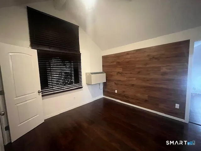 a view of a closet area with an empty room