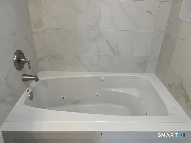 a bathroom with a bathtub