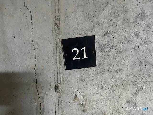 a sign board with a wooden floor