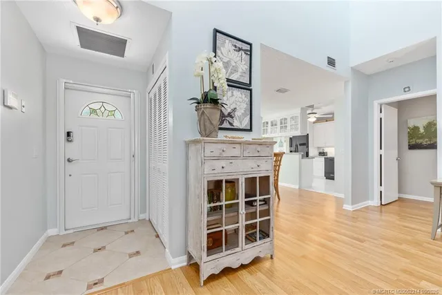 a view of kitchen with sink and cabinets