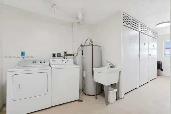 a utility room with dryer and washer