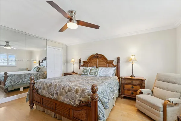 a bedroom with a bed and a couch