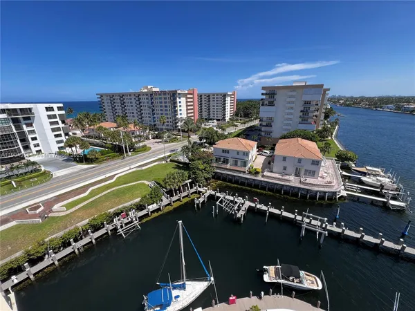a view of a balcony with chairs